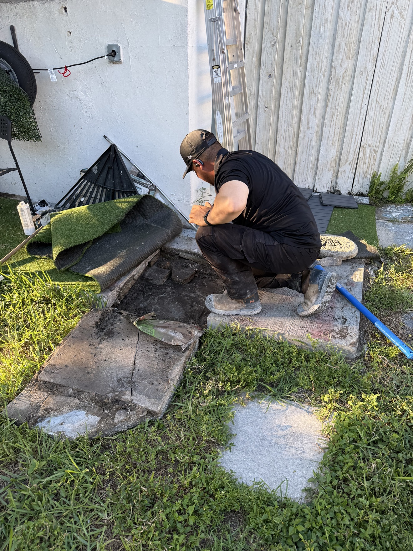 Wide view of the septic work area beside the house